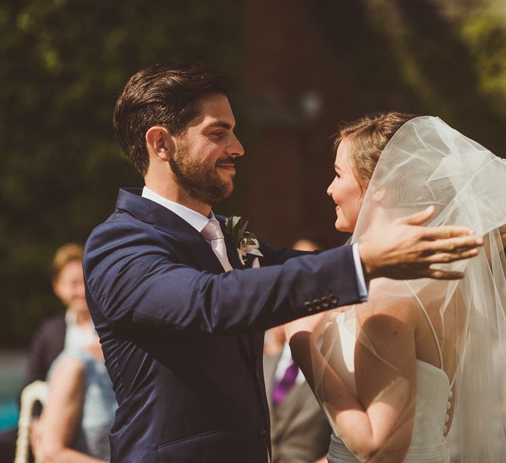 Wedding Ceremony | Bride in Karen Willis Holmes Gown | Groom in Navy Peter Jackson Suit | Outdoor Destination Wedding at Villa Regina Teodolinda, Lake Como, Italy | Matt Penberthy Photography