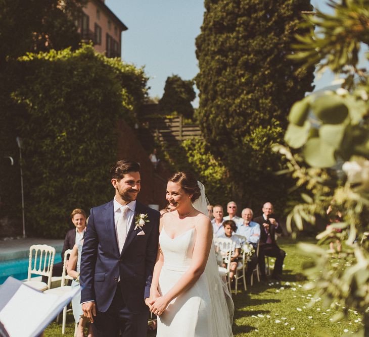 Wedding Ceremony | Bride in Karen Willis Holmes Gown | Groom in Navy Peter Jackson Suit | Outdoor Destination Wedding at Villa Regina Teodolinda, Lake Como, Italy | Matt Penberthy Photography