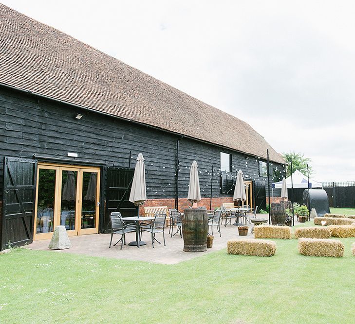 Lillibrooke Manor Wedding With Bright Pink Colour Scheme & Bride In Wtoo by Watters With Bridesmaids In Forest Green Images By Ilaria Petrucci Photography