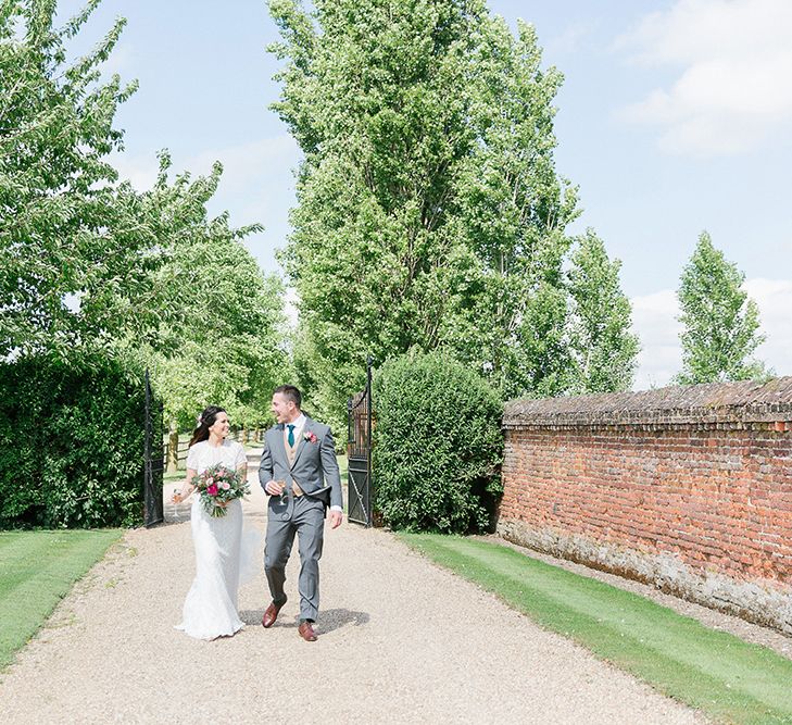 Lillibrooke Manor Wedding With Bright Pink Colour Scheme & Bride In Wtoo by Watters With Bridesmaids In Forest Green Images By Ilaria Petrucci Photography