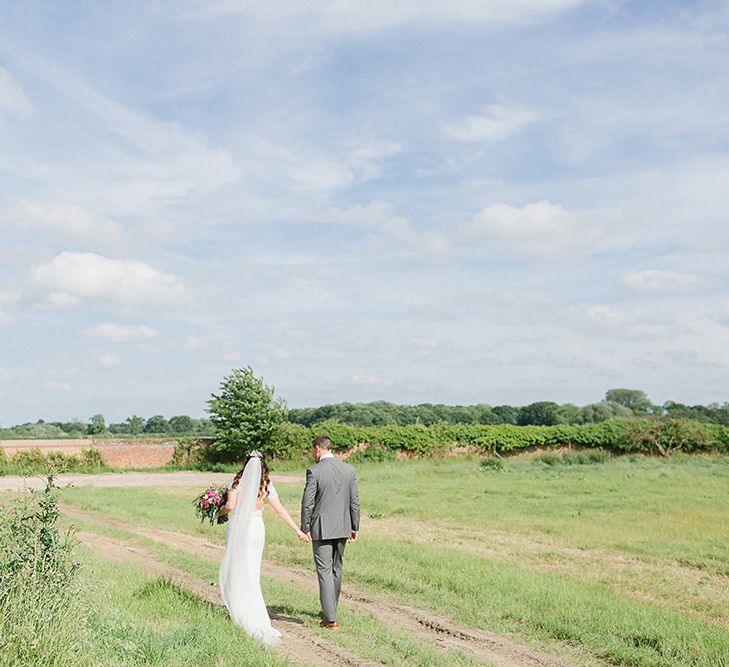 Lillibrooke Manor Wedding With Bright Pink Colour Scheme & Bride In Wtoo by Watters With Bridesmaids In Forest Green Images By Ilaria Petrucci Photography