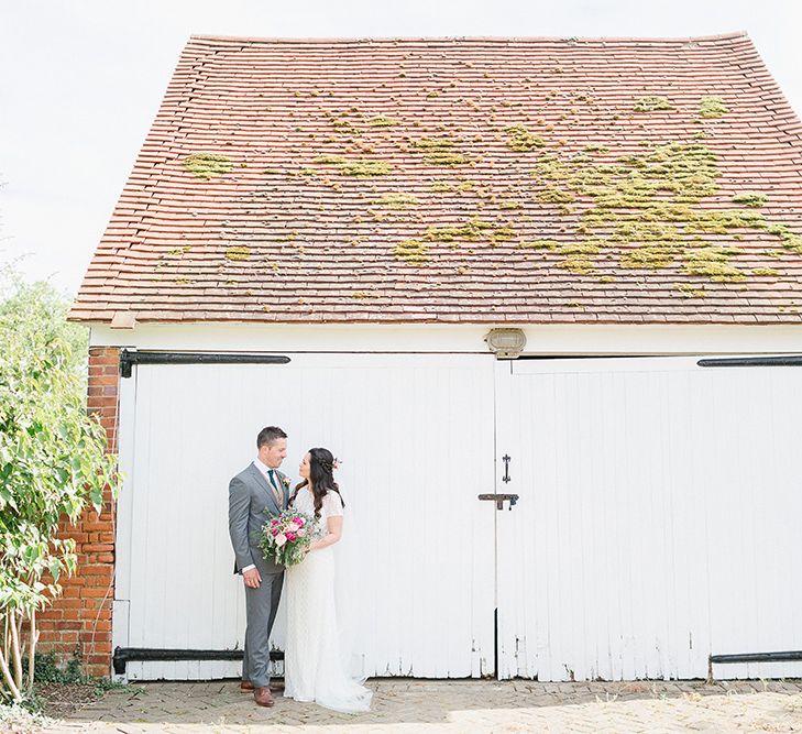 Lillibrooke Manor Wedding With Bright Pink Colour Scheme & Bride In Wtoo by Watters With Bridesmaids In Forest Green Images By Ilaria Petrucci Photography