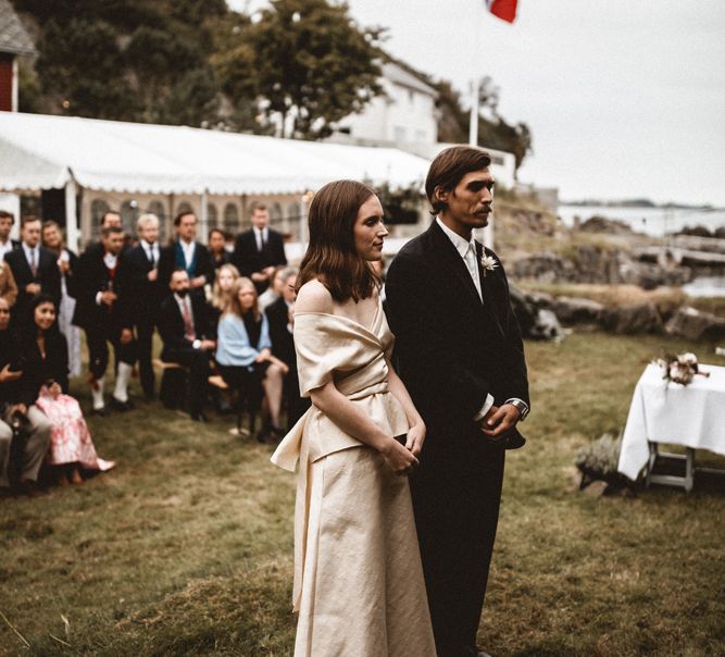 Outdoor Coastal Wedding at Stolmen, Norway | Bride in The Row Dress (SS15) from The Outnet | Benjamin Wheeler Photography