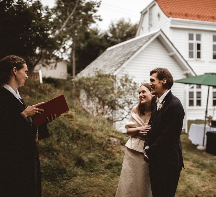 Outdoor Coastal Wedding at Stolmen, Norway | Bride in The Row Dress (SS15) from The Outnet | Benjamin Wheeler Photography