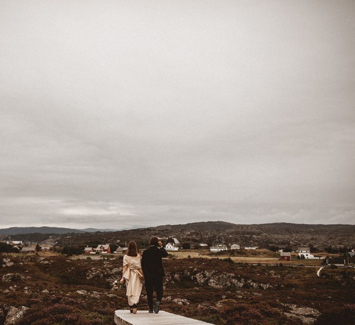 Outdoor Coastal Wedding at Stolmen, Norway | Bride in The Row Dress (SS15) from The Outnet | Benjamin Wheeler Photography