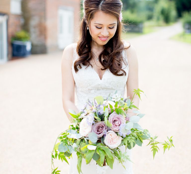 Elegant Bride in Pronovias Wedding Dress with Darling & Wild Romantic Bouquet