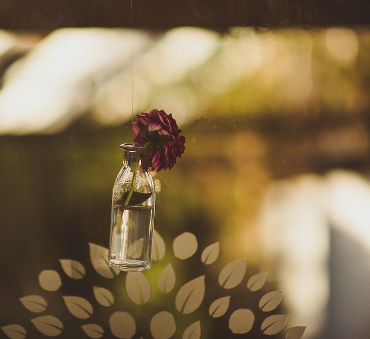 Hanging Bottle with Flower Stem Wedding Decor