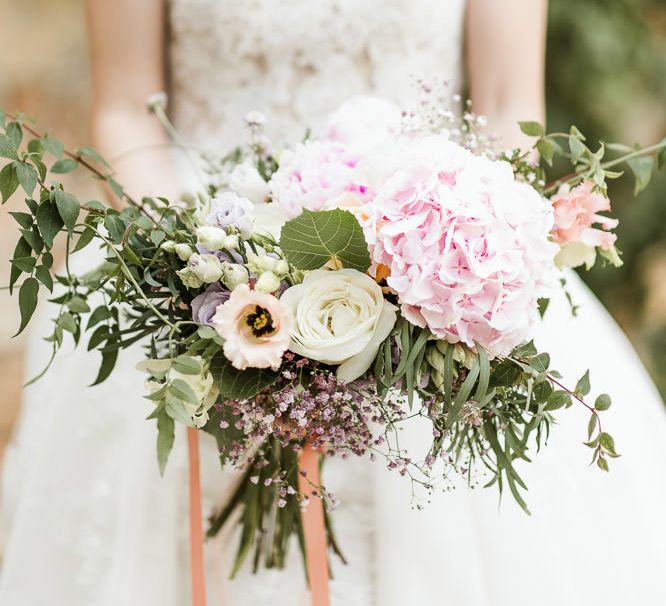 Close up of pink wedding bouquet