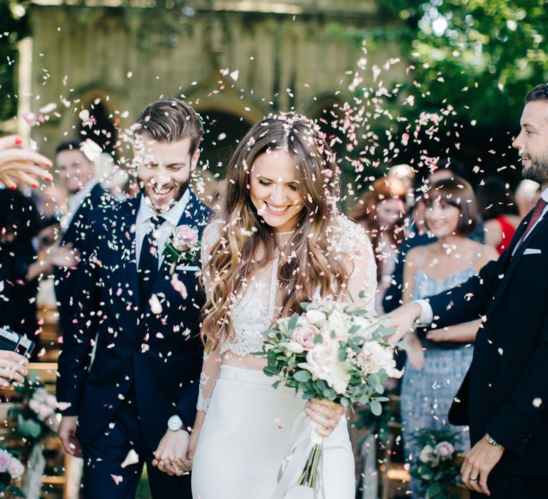 Confetti shot as couple exit ceremony 