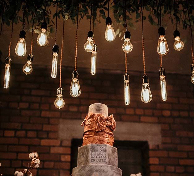 Marble Wedding Cake | Edison Lights | Industrial Wedding Inspiration at Victoria Warehouse in Manchester | Planning & Styling by The Urban Wedding Company | 2 Ducks Galleries