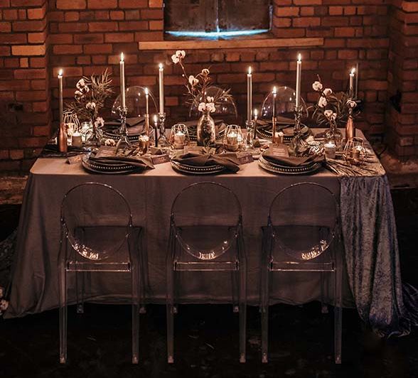 Candle Light Table Scape with Ghost Chairs & Glass Platters | Edison Lights | Industrial Wedding Inspiration at Victoria Warehouse in Manchester | Planning & Styling by The Urban Wedding Company | 2 Ducks Galleries