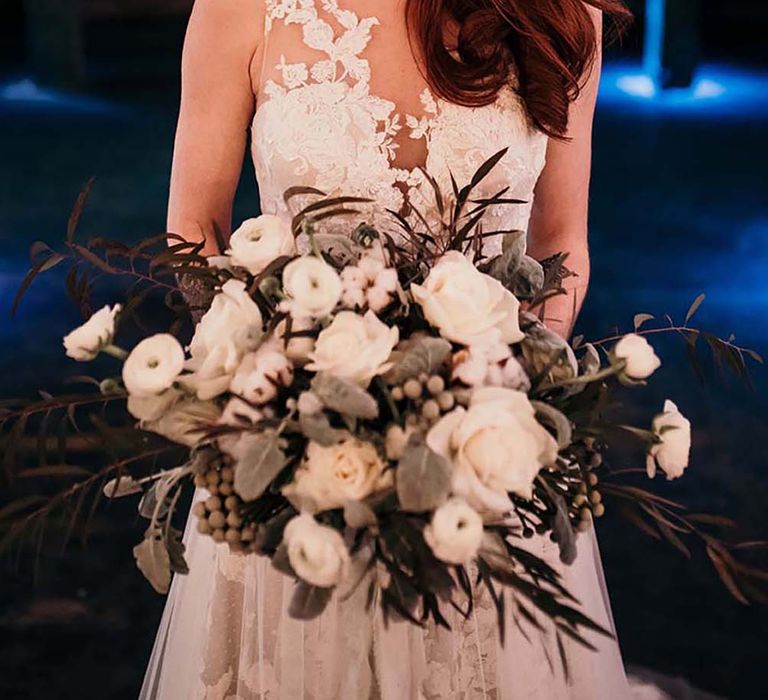 Bride in Lace Gown from Frock & Soul | White Rose & Cotton Bud Bouquet | Industrial Wedding Inspiration at Victoria Warehouse in Manchester | Planning & Styling by The Urban Wedding Company | 2 Ducks Galleries