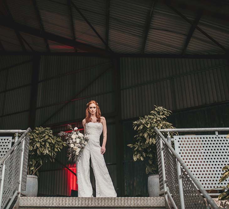 Stylish Bride in Jumpsuit | White Rose & Cotton Bud Bouquet | Industrial Wedding Inspiration at Victoria Warehouse in Manchester | Planning & Styling by The Urban Wedding Company | 2 Ducks Galleries