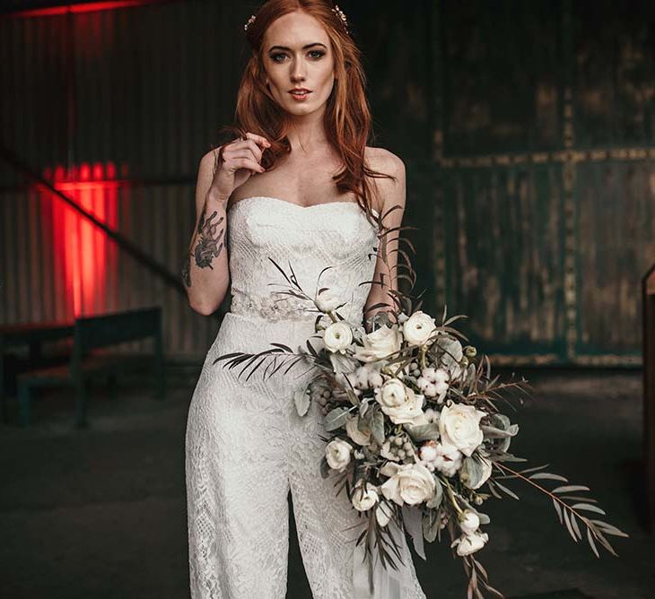 Stylish Bride in Jumpsuit | White Rose & Cotton Bud Bouquet | Industrial Wedding Inspiration at Victoria Warehouse in Manchester | Planning & Styling by The Urban Wedding Company | 2 Ducks Galleries