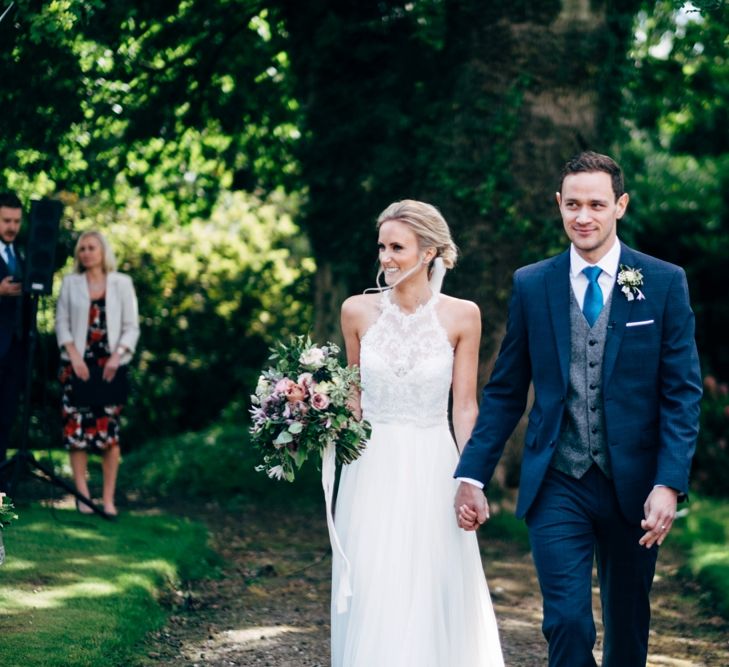 Outdoor Wedding Ceremony | Bride in Watters Peyton Top & Gracia Skirt Bridal Separates | Groom in Next Suit | Rustic Wedding at Patricks Barn, Sussex | Dale Weeks Photography | Love Filmed