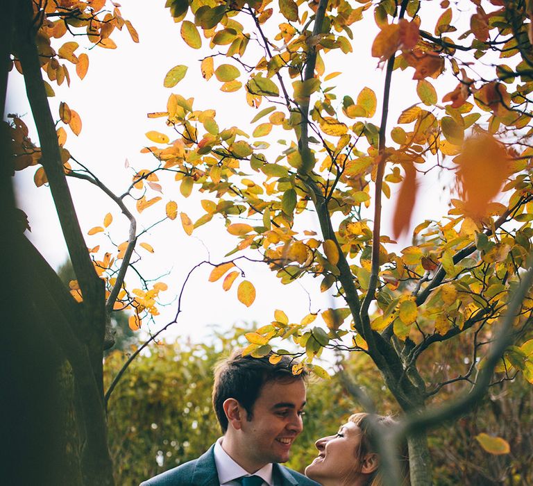 Bride in Ghost Dress, Fur Jacket & Autumnal Bouquet