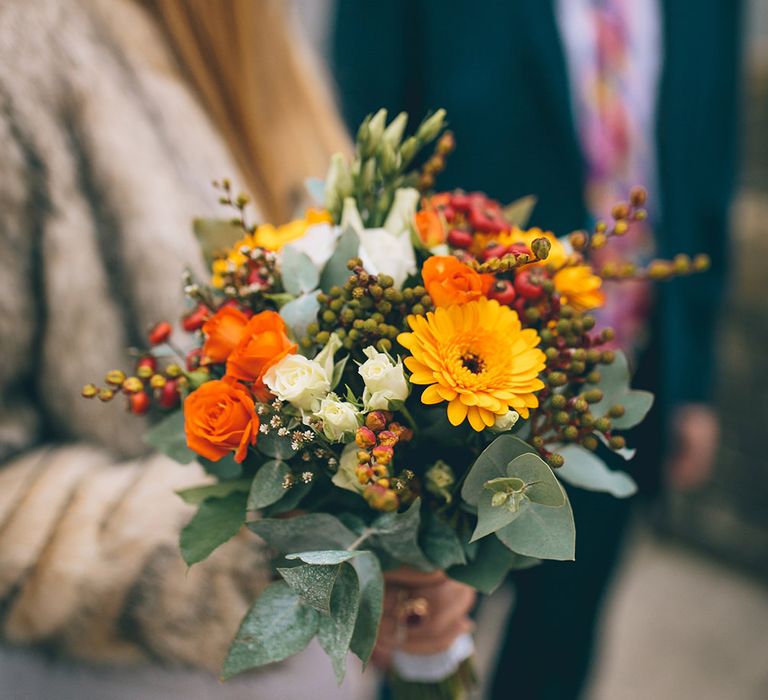 Bride in Ghost Dress, Fur Jacket & Autumnal Bouquet