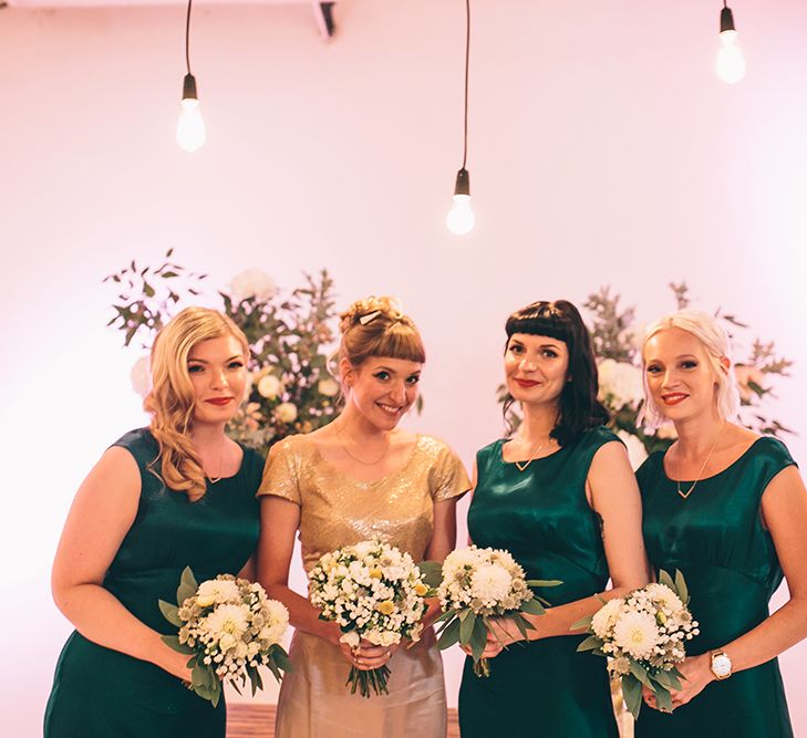 Bride in Bespoke Gold Gown and Bridesmaids in Forest Green Ghost Dresses