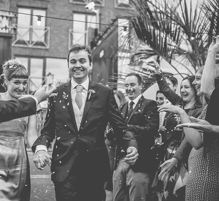 Bride in Bespoke Gold Gown & Groom in Moss Bros Hire Suit