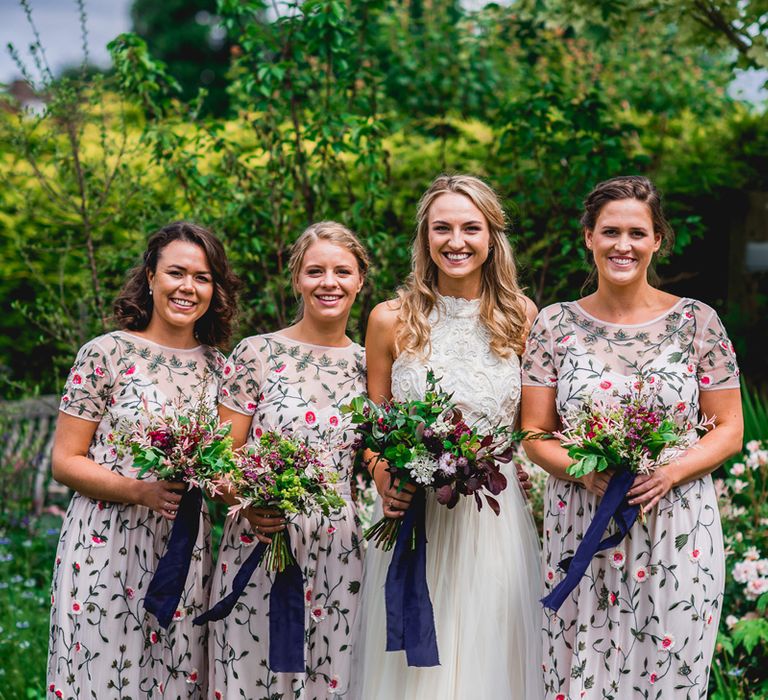 Bridal Party | Bridesmaids in Floral Miss Selfridge Maxi Dresses | Bride in Catherine Deane Carly Bridal Gown | Bright At Home Tipi Wedding | Barney Walters Photography