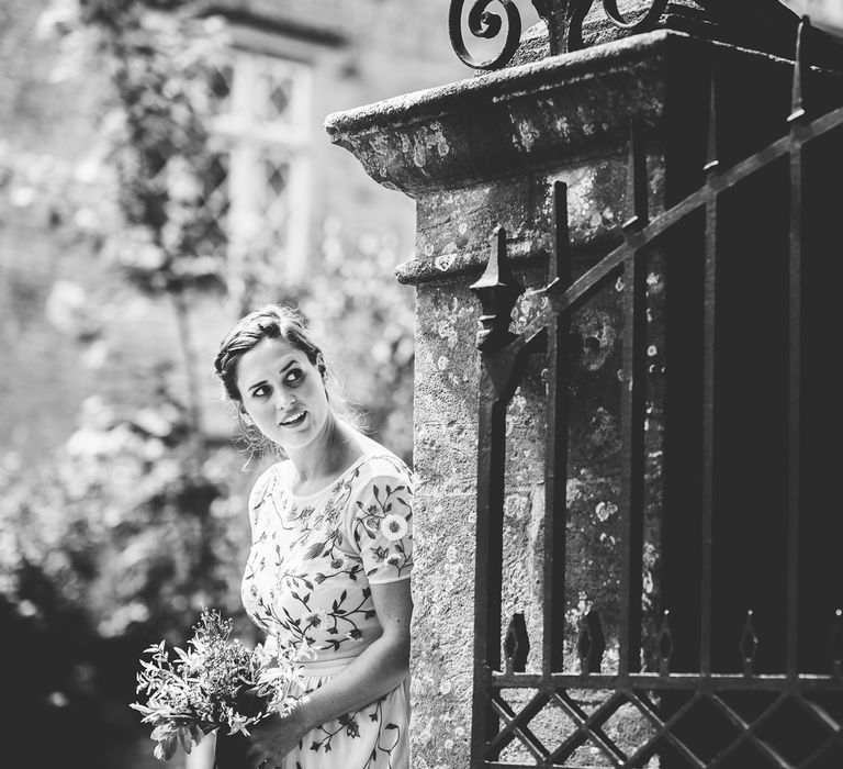 Bridesmaid in Floral Miss Selfridge Dress | Bright At Home Tipi Wedding | Barney Walters Photography