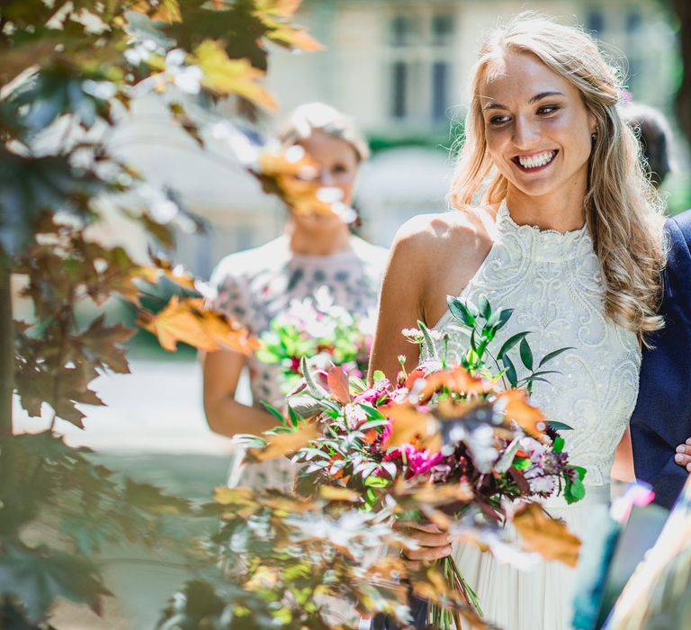 Bride in Catherine Deane Carly Bridal Gown | Bright At Home Tipi Wedding | Barney Walters Photography