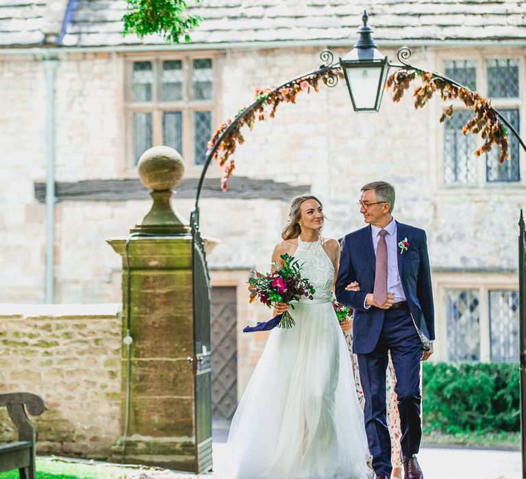 Bride Entrance in Catherine Deane Carly Bridal Gown | Bright At Home Tipi Wedding | Barney Walters Photography