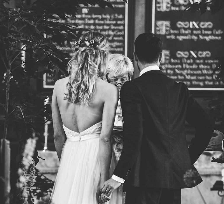 Church Wedding Ceremony | Bride in Catherine Deane Carly Bridal Gown | Groom in Navy Suit | Bright At Home Tipi Wedding | Barney Walters Photography