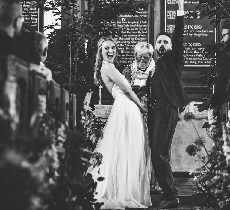 Church Wedding Ceremony | Bride in Catherine Deane Carly Bridal Gown | Groom in Navy Suit | Bright At Home Tipi Wedding | Barney Walters Photography