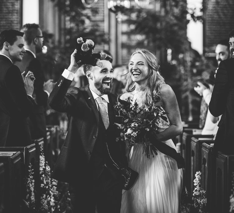 Church Wedding Ceremony | Bride in Catherine Deane Carly Bridal Gown | Groom in Navy Suit | Bright At Home Tipi Wedding | Barney Walters Photography