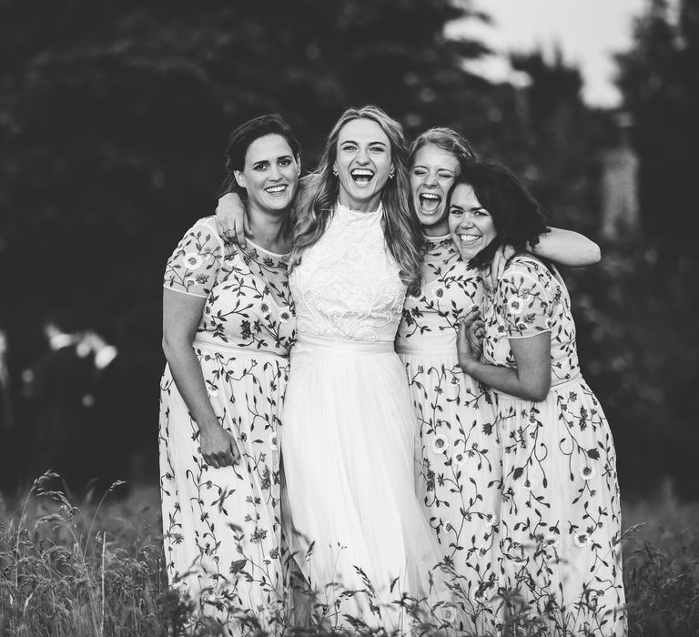 Bridesmaids in Floral Miss Selfridge maxi Dresses | Bride in Catherine Deane Carly Bridal Gown | Bright At Home Tipi Wedding | Barney Walters Photography