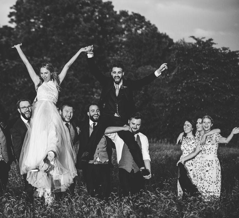 Wedding Party | Bride in Catherine Deane Carly Bridal Gown | Groom in Navy Suit | Bright At Home Tipi Wedding | Barney Walters Photography