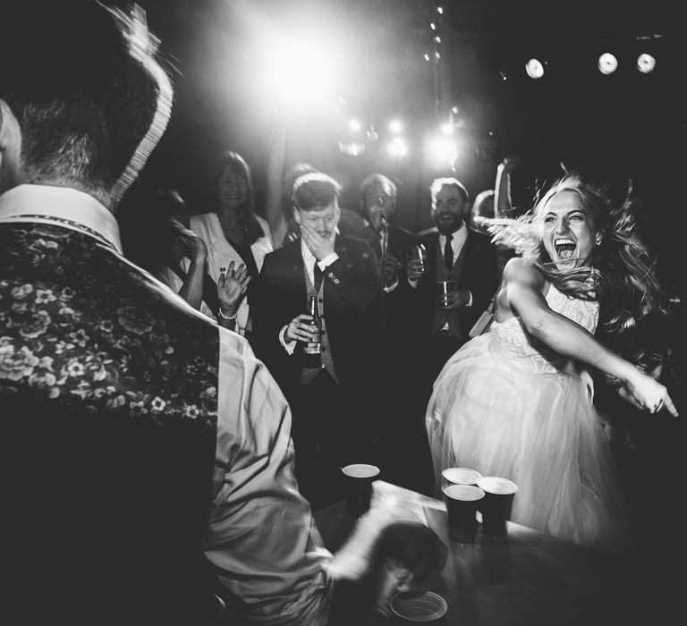 Beer Pong | Bride in Catherine Deane Carly Bridal Gown | Groom in Navy Suit | Bright At Home Tipi Wedding | Barney Walters Photography