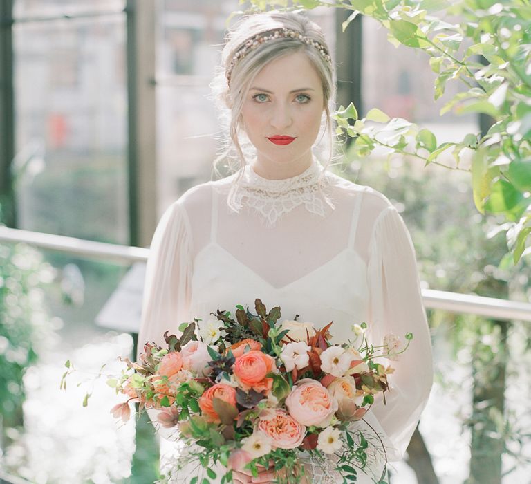 Beautiful Bride With Bright Red Lip And Soft Up Do