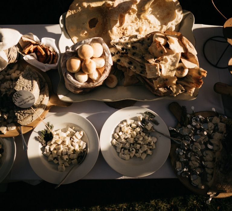 Romantic Outdoor Destination Wedding Umbria With White Linen, Foliage And Gold Accents With Bride In Bespoke Lace Dress And Images From Andrea & Federica