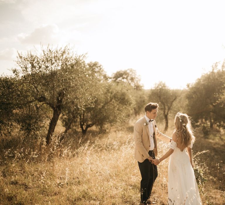 Romantic Outdoor Destination Wedding Umbria With White Linen, Foliage And Gold Accents With Bride In Bespoke Lace Dress And Images From Andrea & Federica