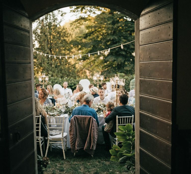 Romantic Outdoor Destination Wedding Umbria With White Linen, Foliage And Gold Accents With Bride In Bespoke Lace Dress And Images From Andrea & Federica