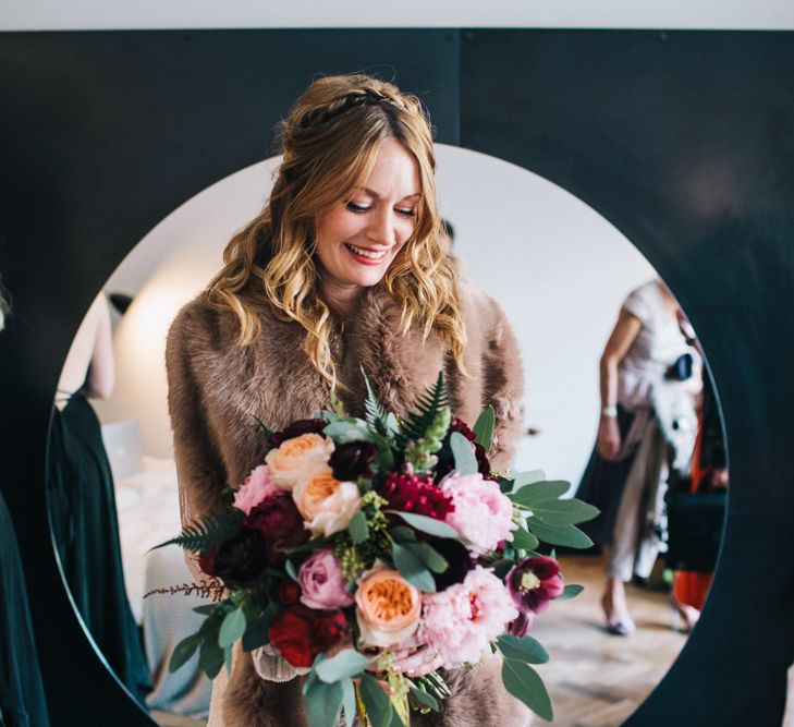 Bride In Faux Fur Jacket For Winter Wedding