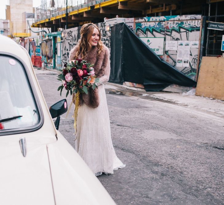 Bride In Faux Fur Jacket For Winter Wedding