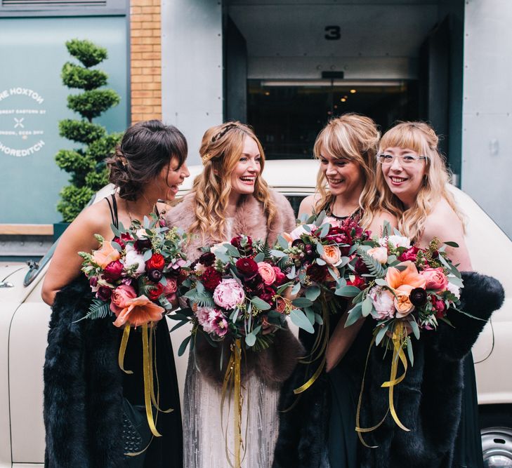 Bride In Faux Fur Jacket For Winter Wedding & Bridesmaids In Black