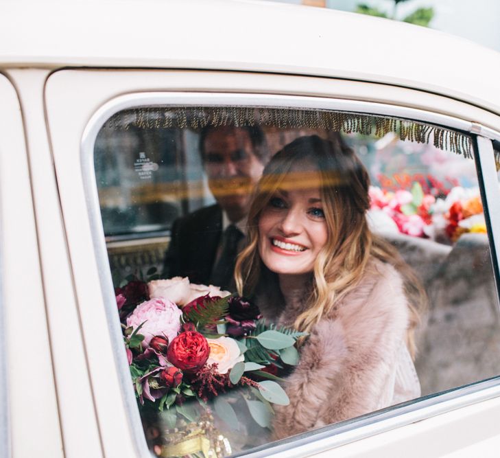 Bride In Faux Fur Jacket For Winter Wedding