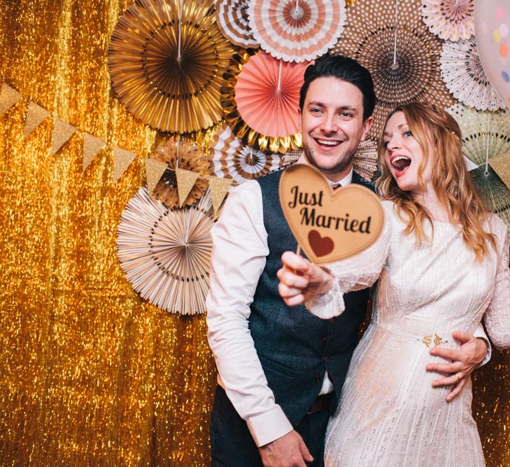 Bride & Groom In Photobooth