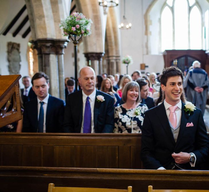 Groom in Traditional Oliver Brown Tailored Suit | Blink Photography