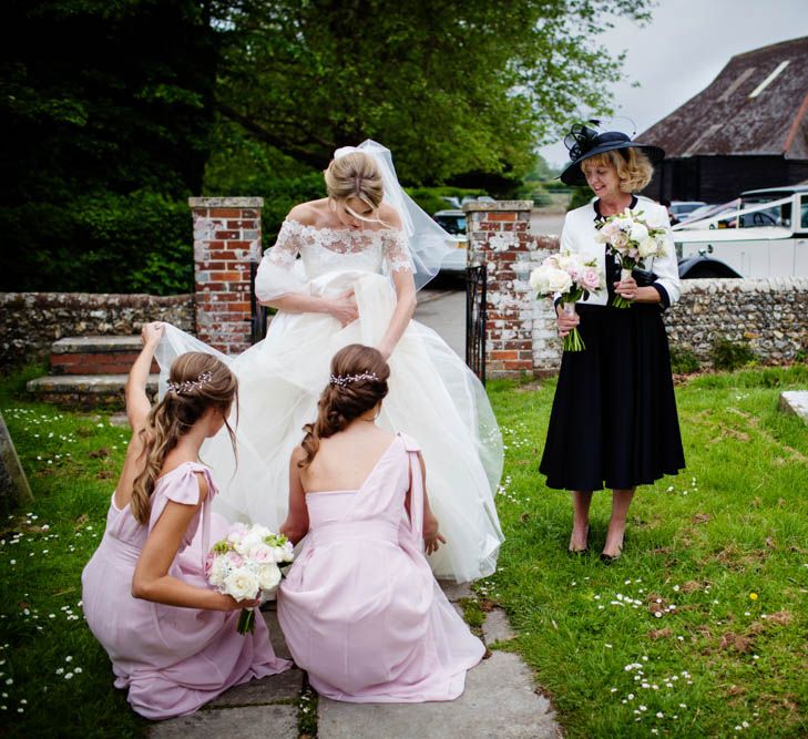 Bridal Party Church Entrance | Bridesmaids in Pink Maids to Measure Dresses | Bride in Sassi Holford Grace Wedding Dress | Blink Photography