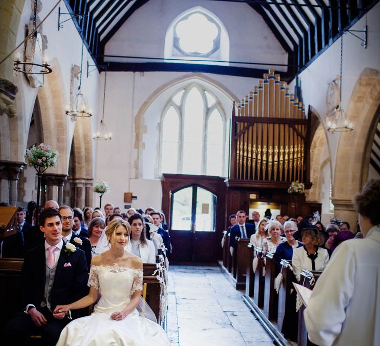 Church Wedding Ceremony | Bride in Sassi Holford Grace Wedding Dress | Groom in Traditional Oliver Brown Tailored Suit | Blink Photography