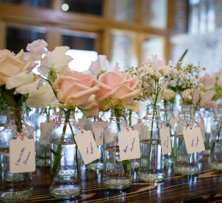 Flower Stem Place Name Decor | Classic Pink Wedding at The Tithe Barn in Hampshire | Blink Photography