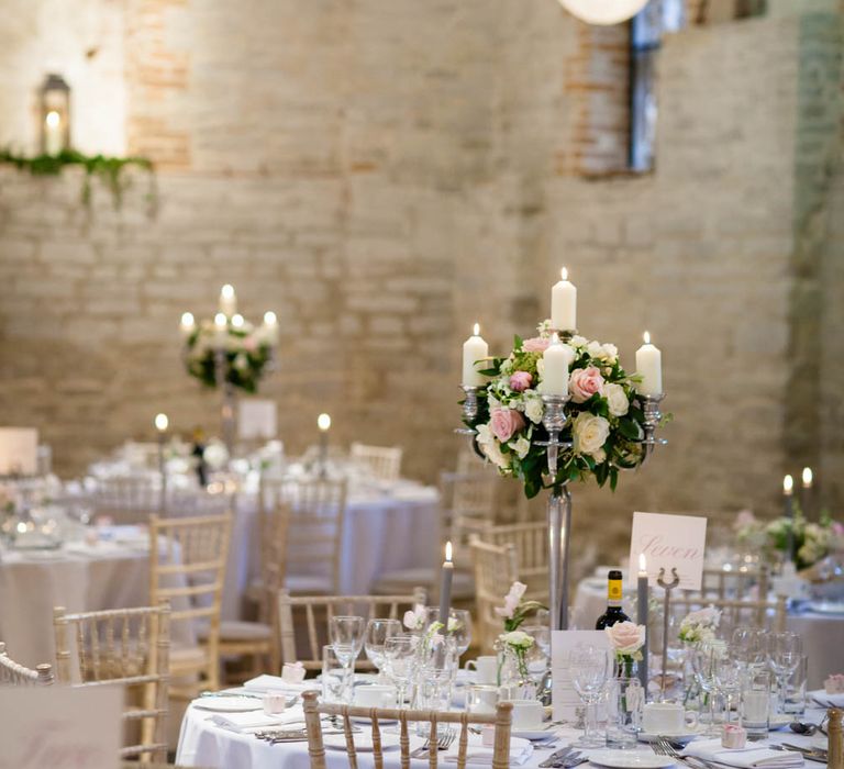 Hanging Lanterns and Floral Candelabra Centrepiece | Classic Pink Wedding at The Tithe Barn in Hampshire | Blink Photography