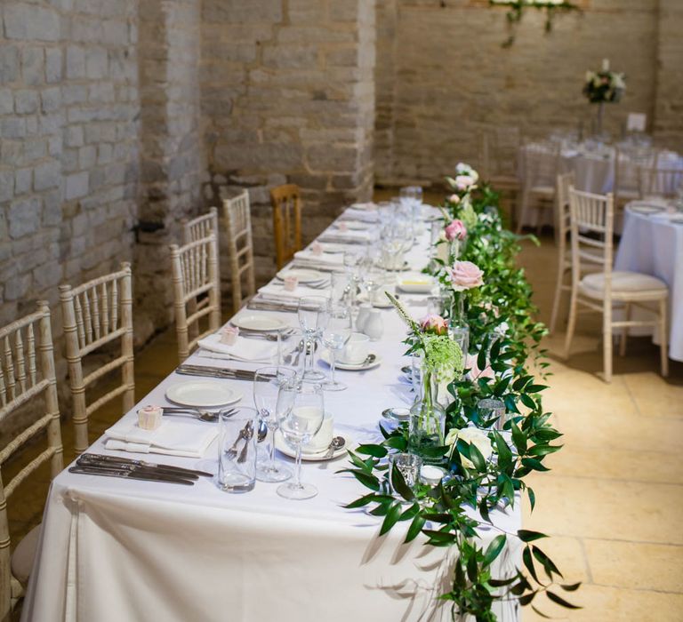 Top Table Floral Arrangement | Classic Pink Wedding at The Tithe Barn in Hampshire | Blink Photography