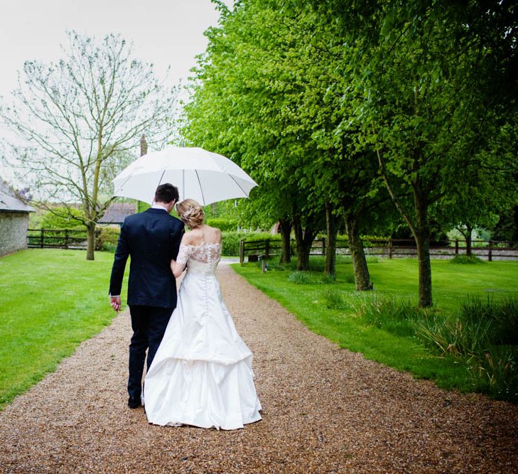 Bride in Sassi Holford Grace Wedding Dress | Groom in Traditional Oliver Brown Tailored Suit | Blink Photography