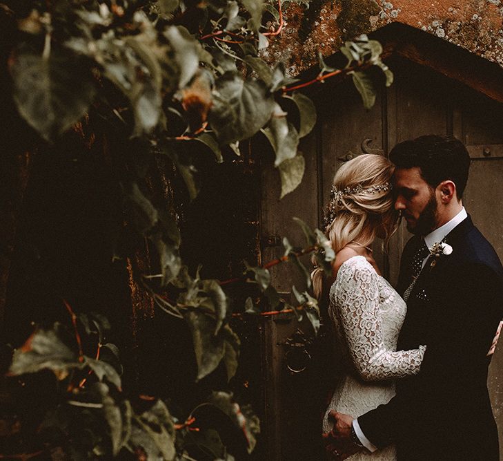 Elegant White Wedding In Somerset With Bride In Lace Long Sleeved Gown With Open Back And Loose Braid With Hair Vine Images From Carla Blain Photography